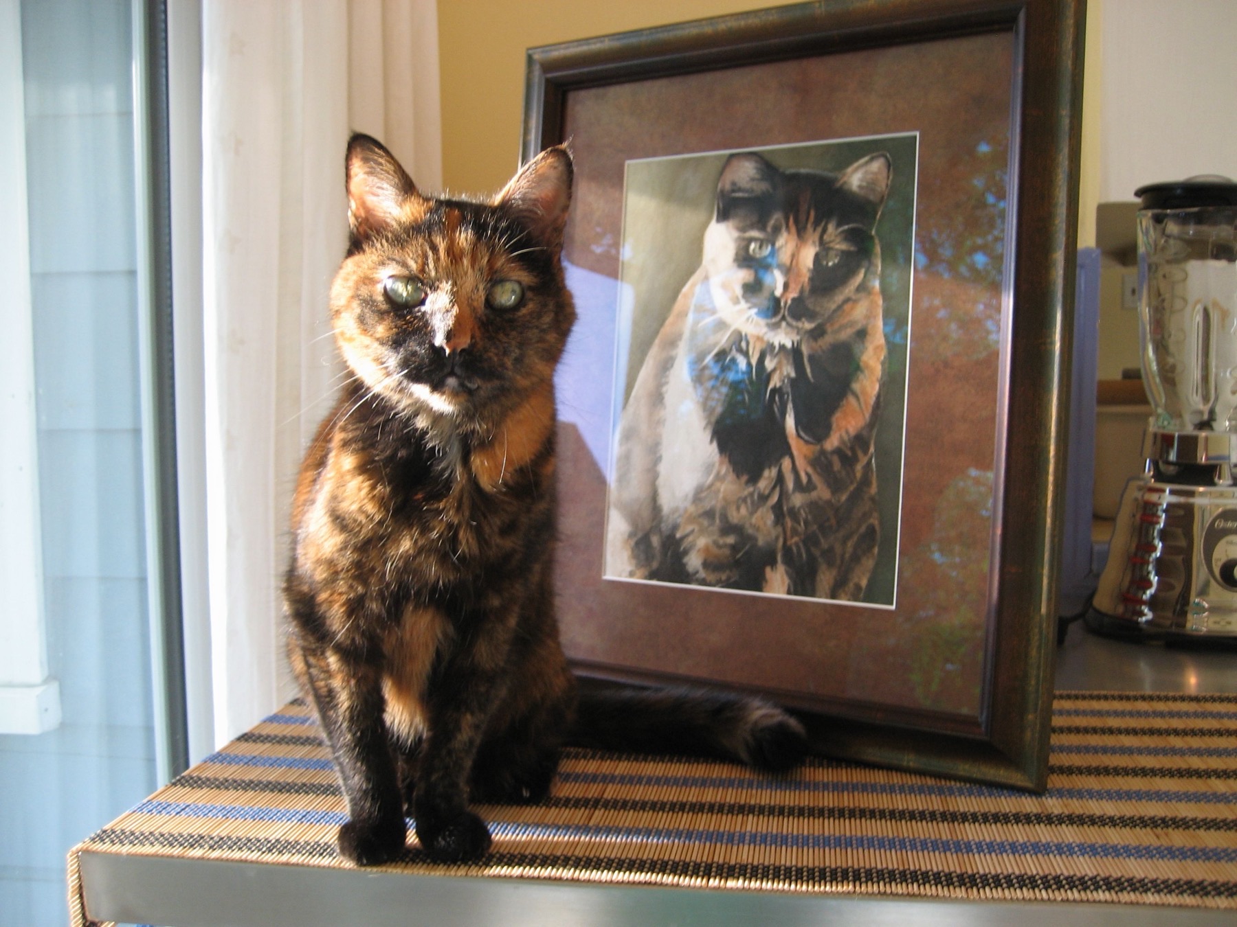 Watercolor portrait of a tortoiseshell cat
